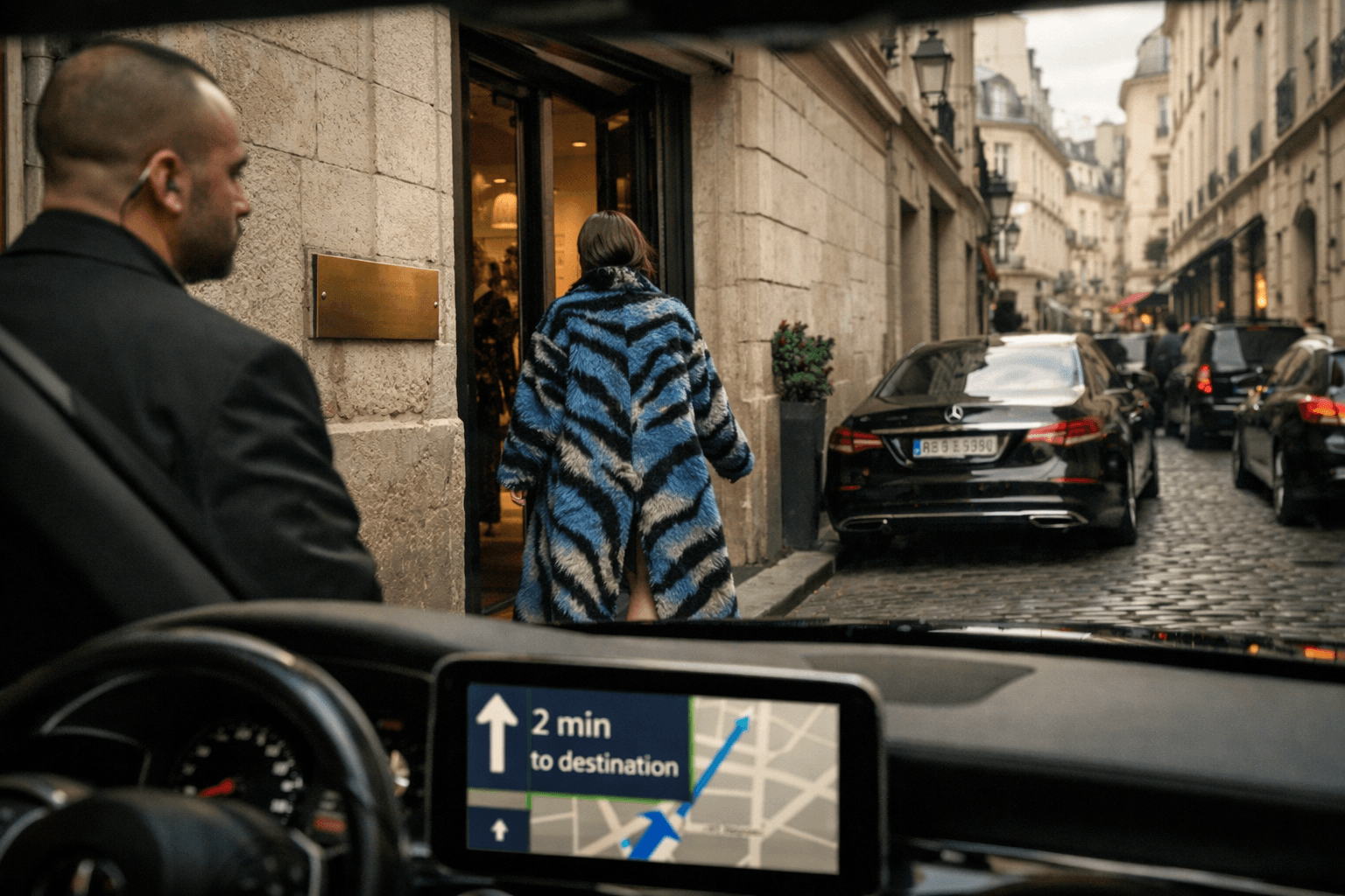 Paris Fashion Week 2026 Chauffeur Logistics: Managing Multi-Show Days Across Grand Palais, Palais De Tokyo, And Exclusive Marais Showrooms 16 () dynamic street-level photograph from chauffeur perspective through windshield: view of exclusive Marais showroom entrance